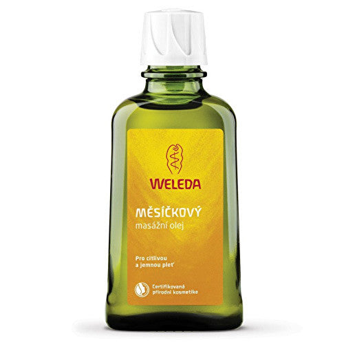 Weleda medetkų masažo aliejus puodelyje